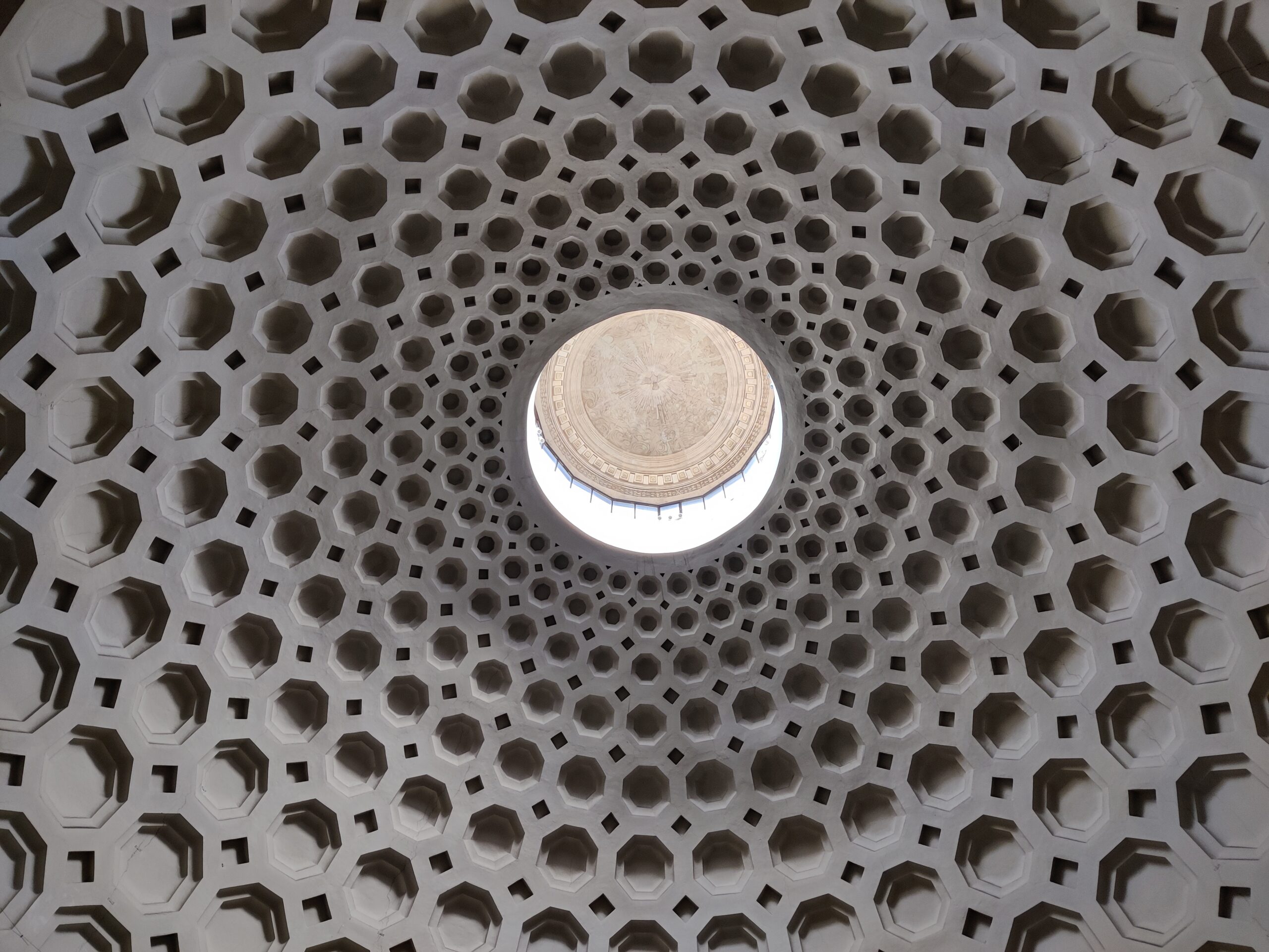 A coffered ceiling made of concentric rings of octagonal niches.